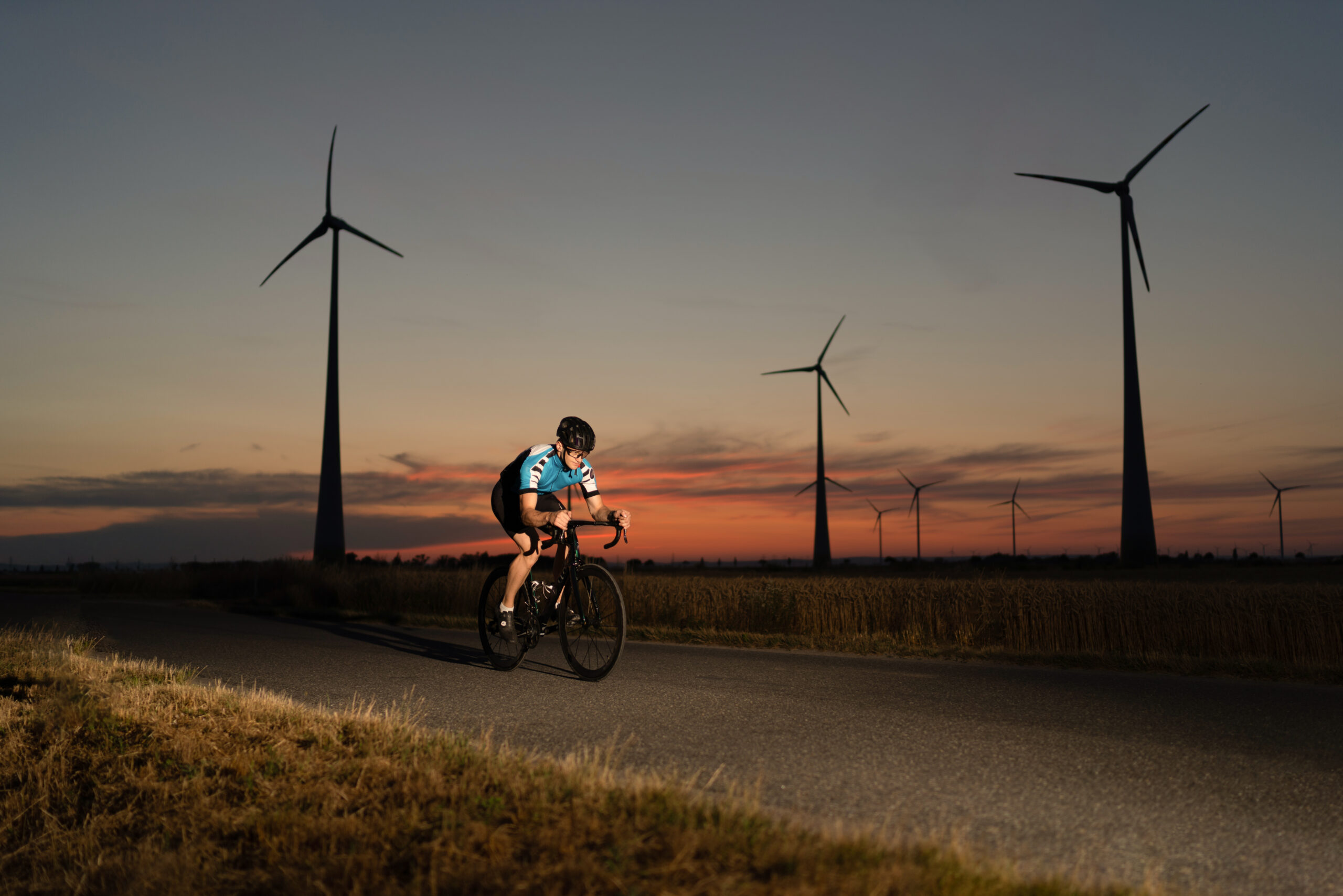 cyclist-on-the-racing-bike-at-sunset-2025-03-09-23-38-38-utc